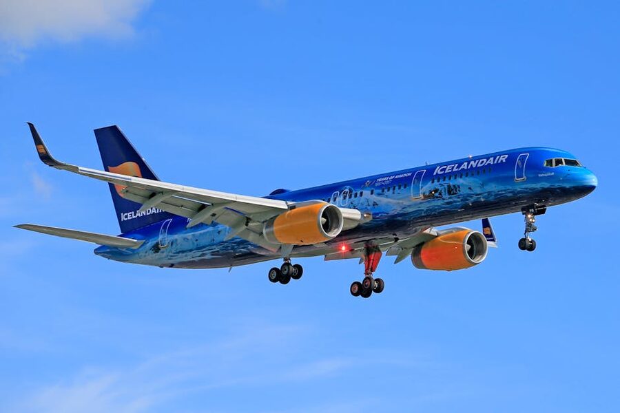 Icelandair airplane in flight against a blue sky
