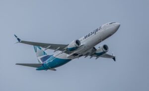 WestJet aircraft soaring